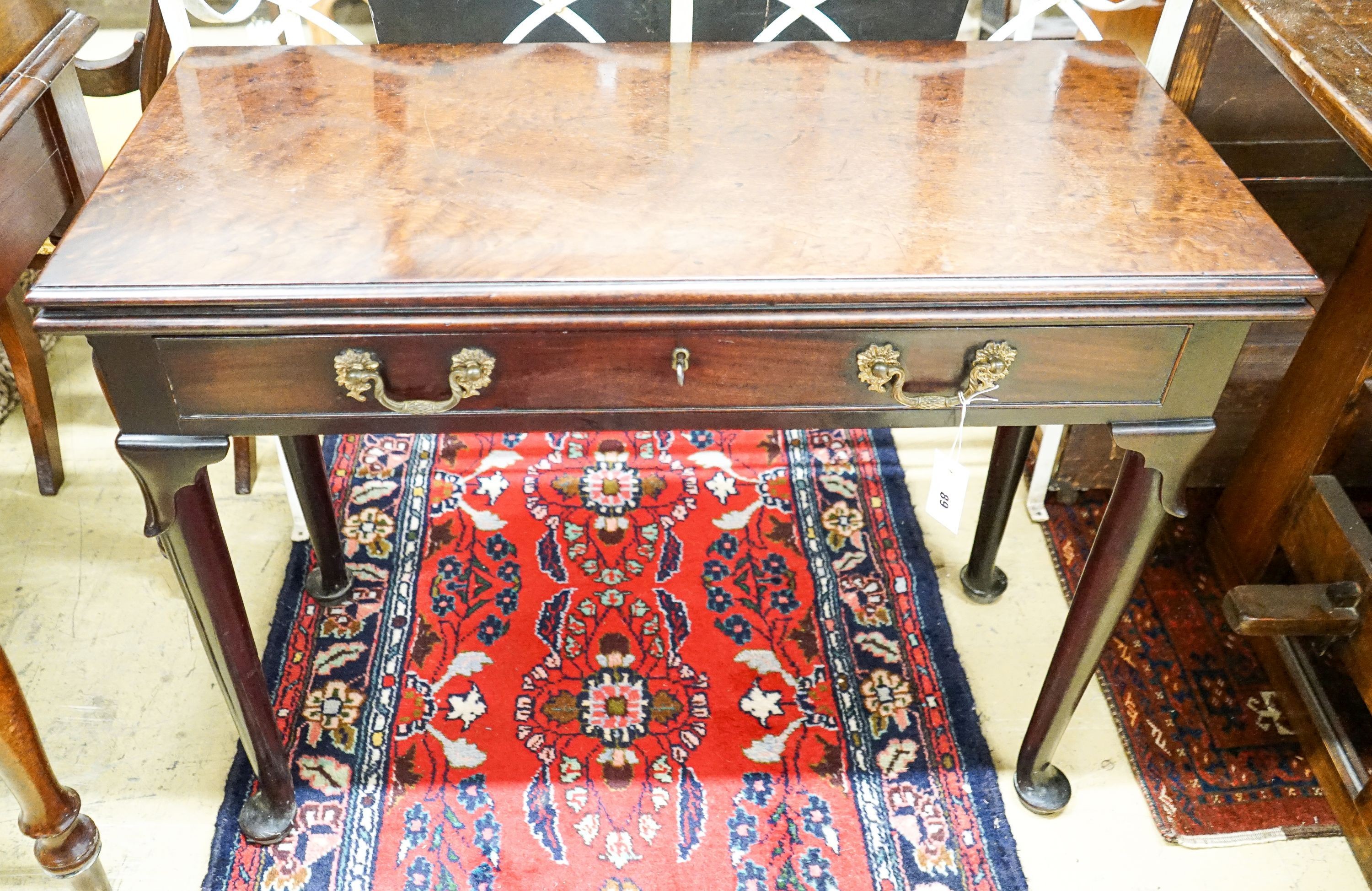 A George II mahogany rectangular folding tea table, width 90cm, depth 41cm, height 72cm